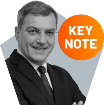 Headshot of Damien Comolli, a keynote speaker