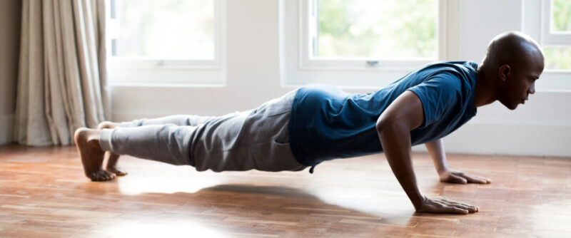 Man doing pushups at home