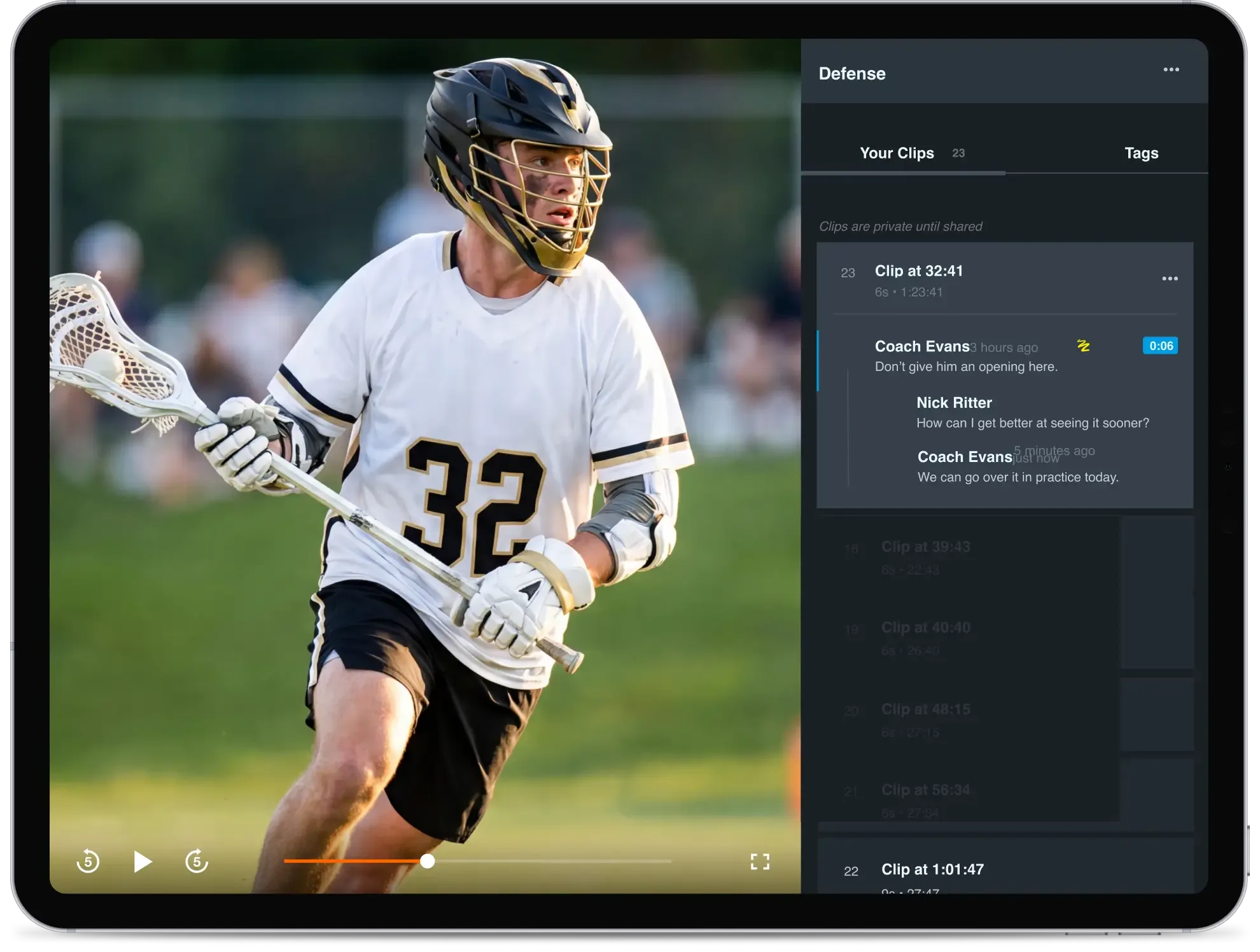 A sports technology interface displayed on a tablet, featuring a video of a male lacrosse player in a white jersey numbered 32 running with his stick on the left, and a 'Defense' analysis sidebar on the right showing video clips and a coaching comment thread.