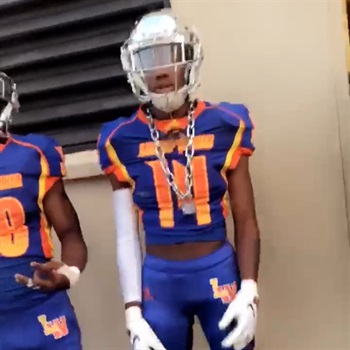 Travis “Milly” Walker Jr